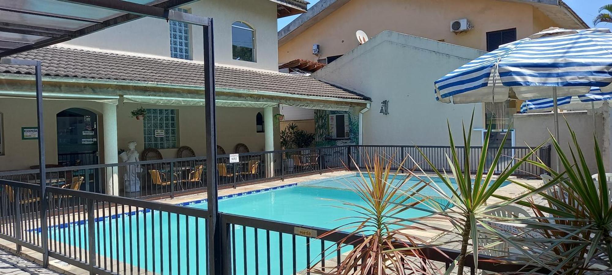 Pousada Parque Suites Estacionamento E Piscina Γκουαρούχα Εξωτερικό φωτογραφία