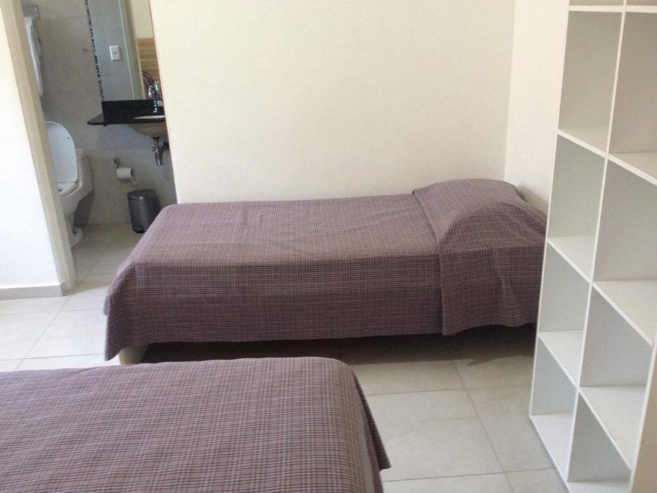 Pousada Parque Suites Estacionamento E Piscina Γκουαρούχα Δωμάτιο φωτογραφία