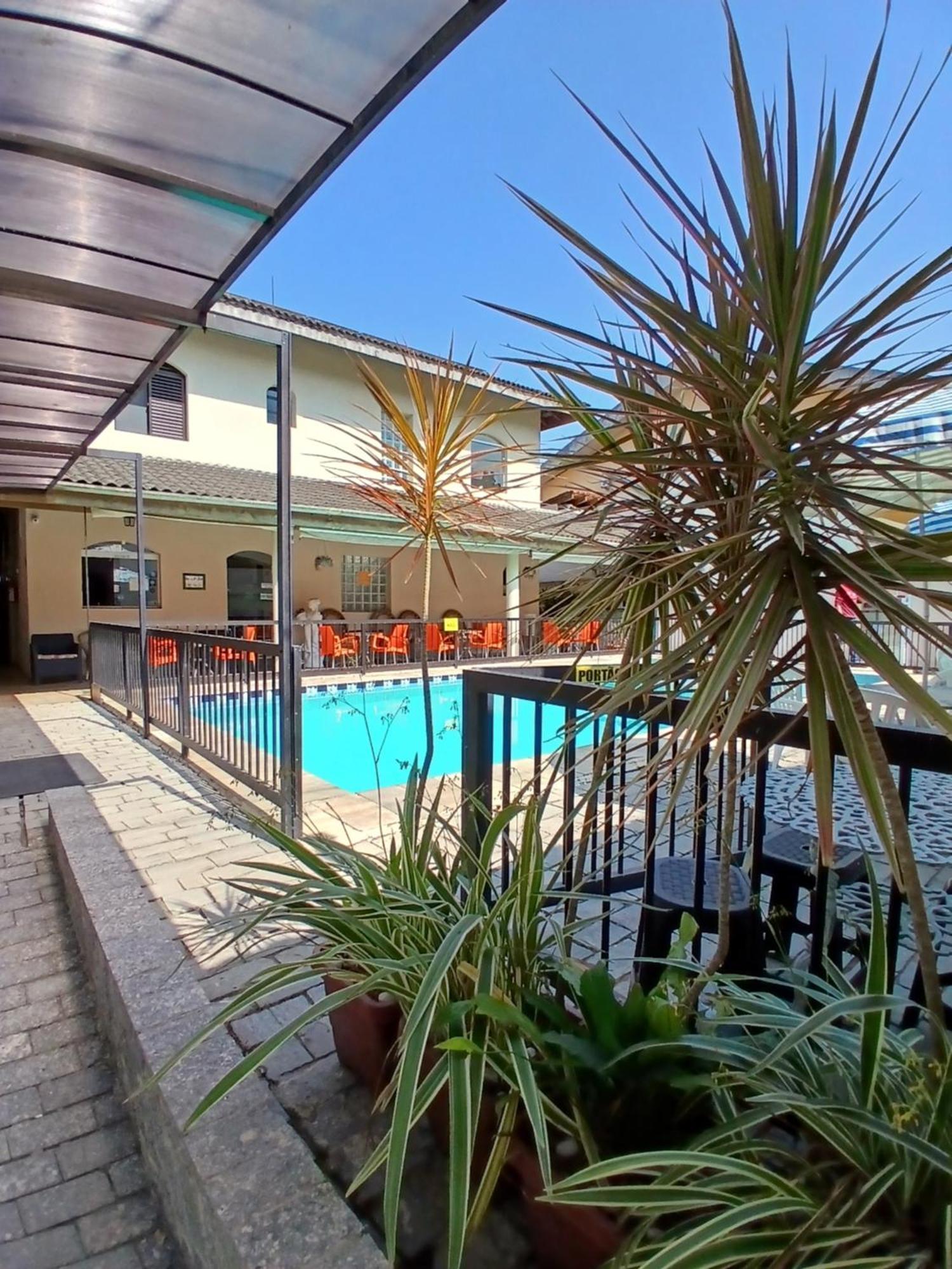 Pousada Parque Suites Estacionamento E Piscina Γκουαρούχα Εξωτερικό φωτογραφία